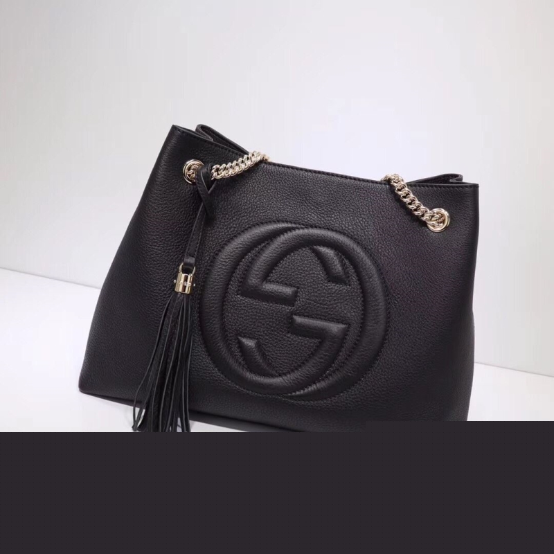 G*u*i top handle bags